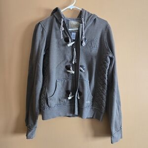 Billabong Hooded Jacket with Wooden Hook Accent Closure.